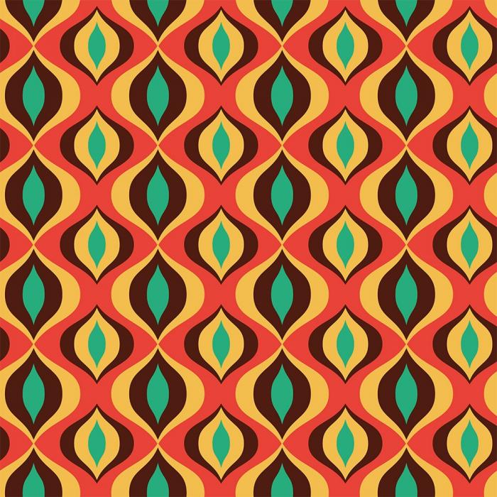 Mustertapete aus Vlies mit einem schrillen 70er-Jahre Muster in bunten Farben