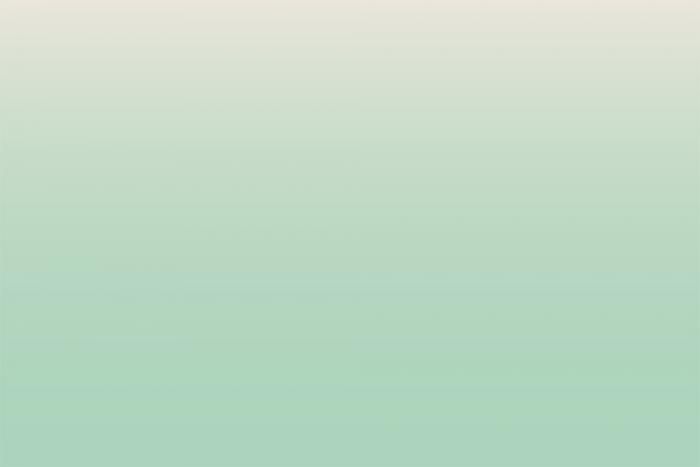 Einfarbige Fototapete mit einem Farbverlauf in Mintgrün