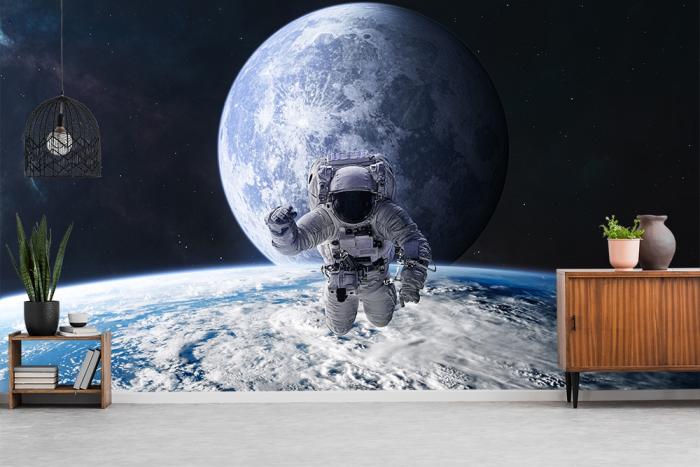 Fototapete Astronaut über der Erde