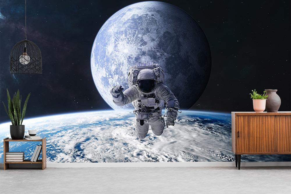 Fototapete Astronaut über der Erde